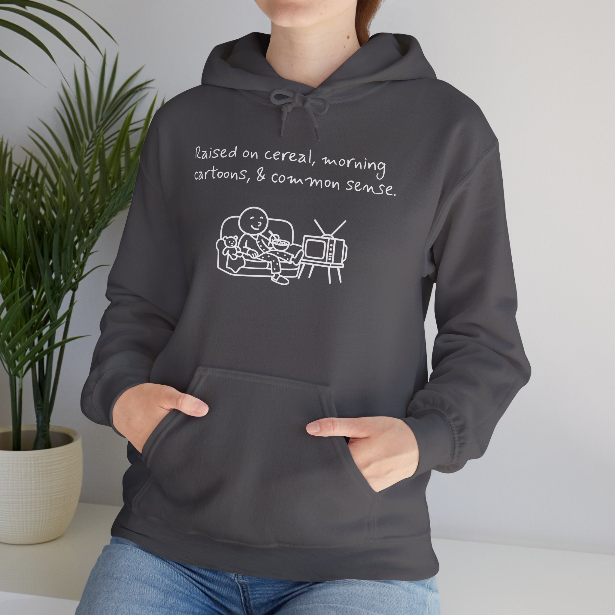 Cartoon & Caption Heavy Blend Hoodie - Raised on Cereal & Morning Cartoons