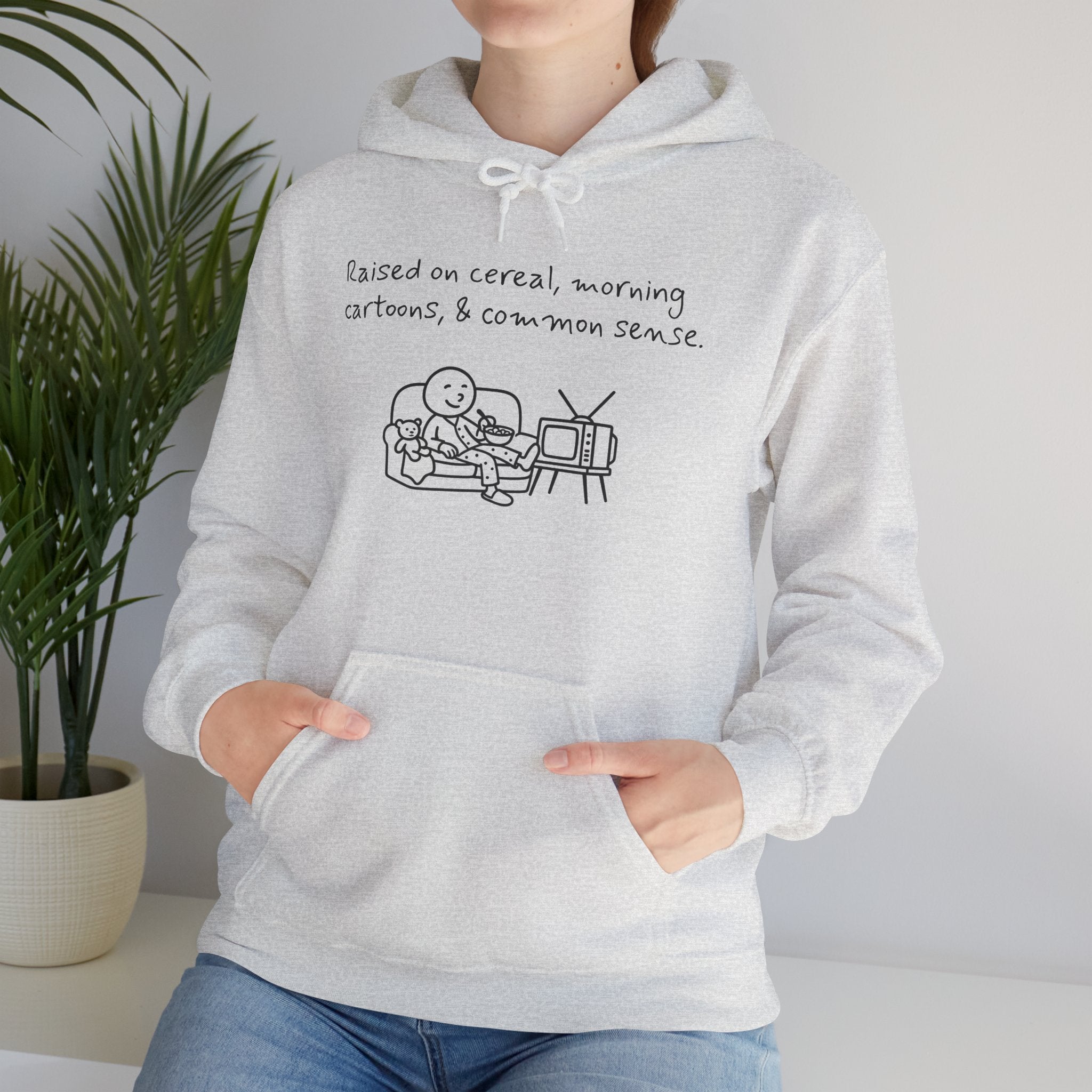 Cartoon & Caption Heavy Blend Hoodie - Raised on Cereal & Morning Cartoons